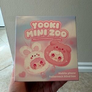 Yooki Little Zoo 7th generation mobile phone lanyard plush blind box.